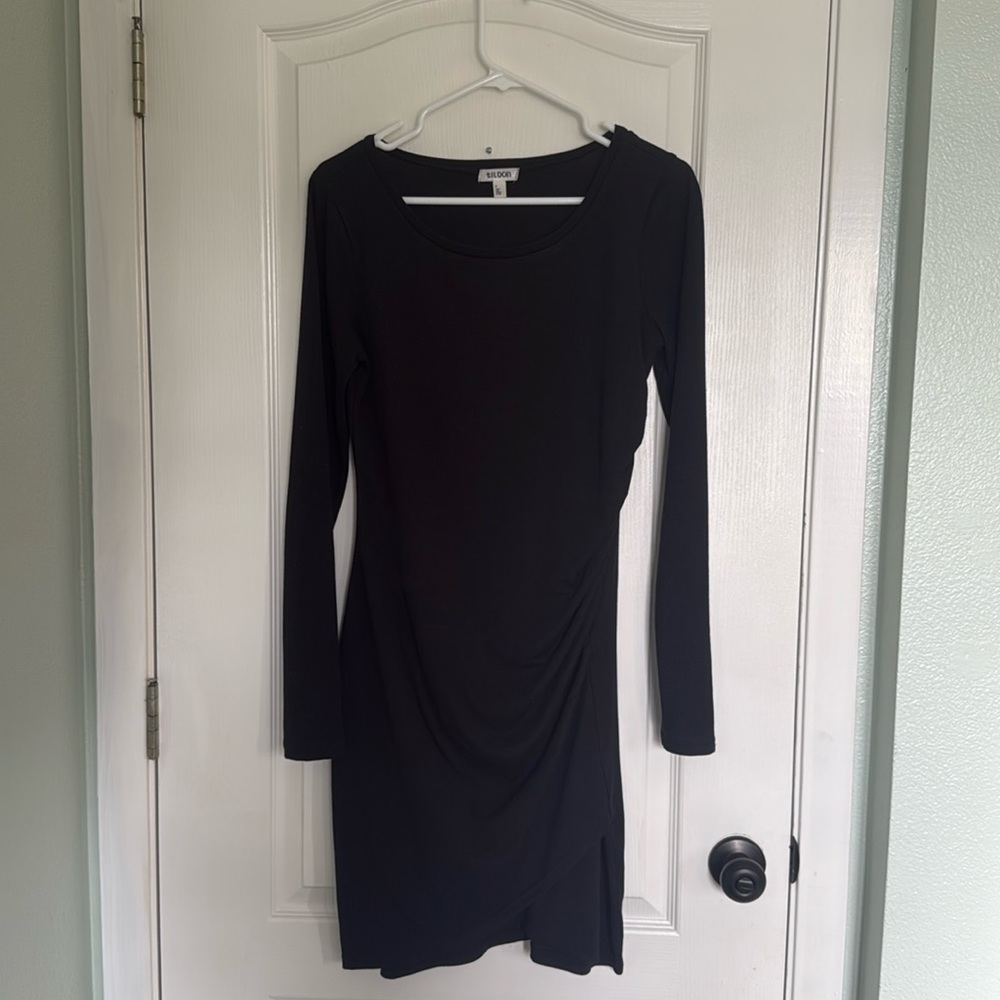 Long sleeve black dress with tulip hem